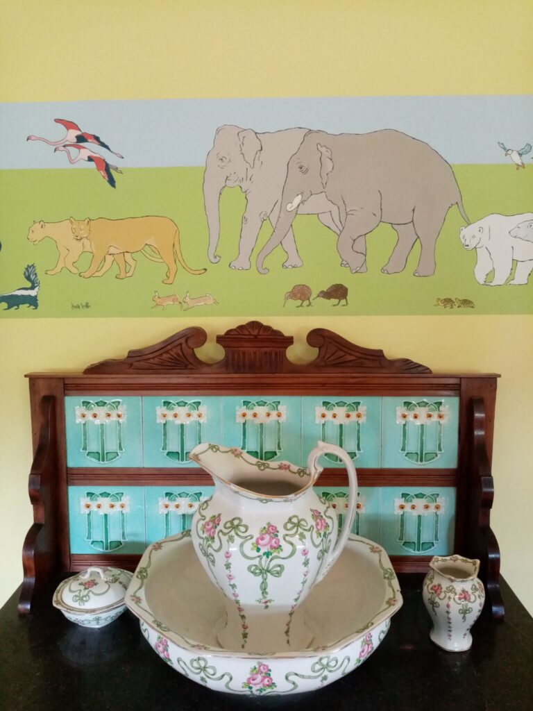A section of the frieze above the washstand