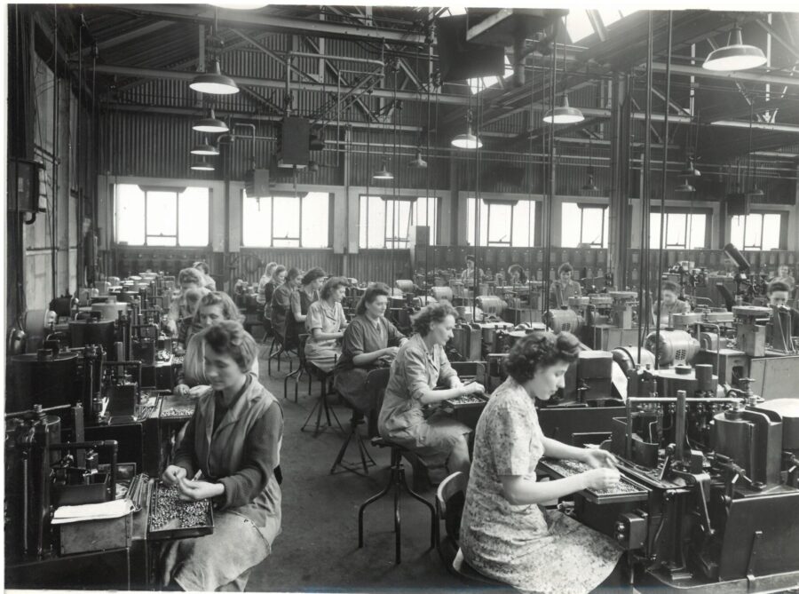 Women checking screws for quality, 1940s