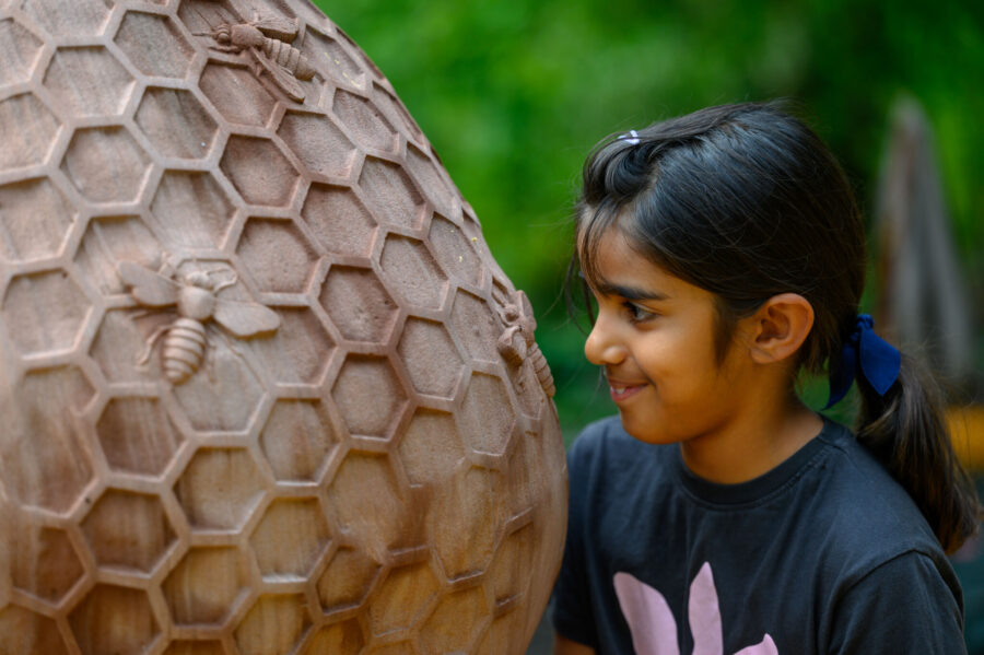 A child up close with the sculpture
